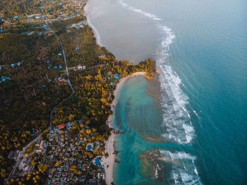 High angle view of waves on beach