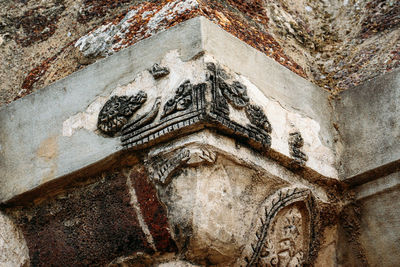 Low angle view of carving on wall
