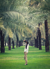 Full length of man standing on grass