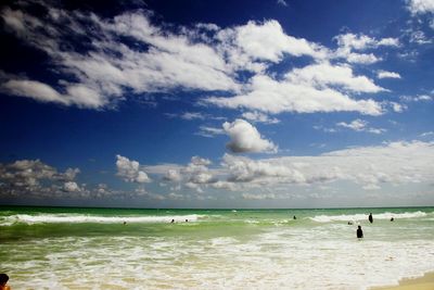 Scenic view of sea against cloudy sky