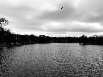 View of lake against cloudy sky