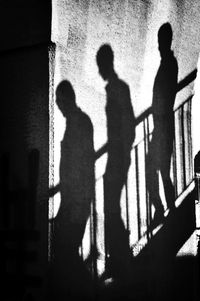 Shadow of man on wall