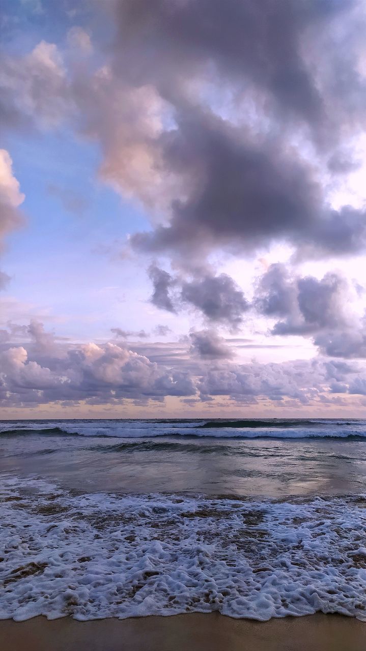 sky, cloud, water, sea, land, beauty in nature, beach, scenics - nature, nature, environment, shore, ocean, wind wave, wave, body of water, dramatic sky, sunset, horizon, coast, sunlight, tranquility, sand, motion, landscape, horizon over water, no people, travel destinations, outdoors, storm, travel, seascape, cloudscape, reflection, tranquil scene, dusk, water sports, tourism, coastline, idyllic