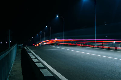 Light trails on road at night