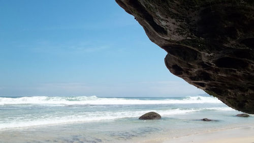 Scenic view of beach against sky