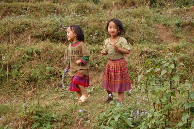 Full length of girl standing on field