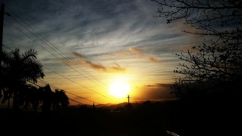 Scenic view of dramatic sky at sunset