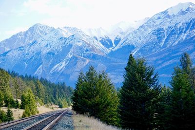 Scenic view of mountains against sky during winter