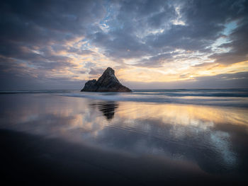 Scenic view of sea against sky during sunset