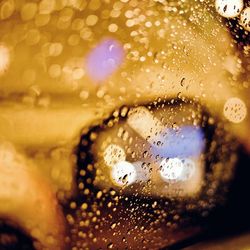 Close-up of water drops on glass