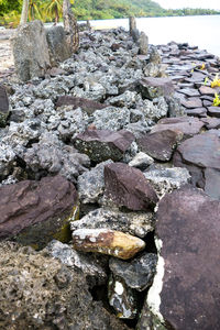 Close-up of pebbles in water