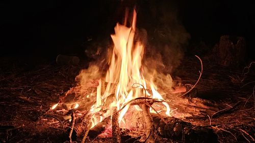 Burning firewood at night