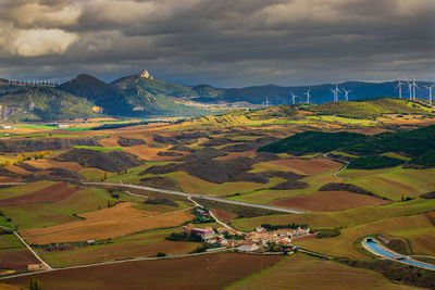 Aerial view of agricultural field against sky