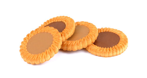 Close-up of cookies against white background