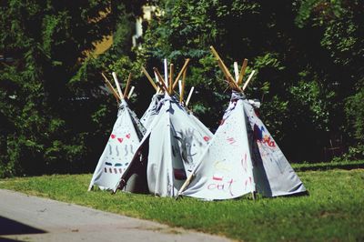 Tent on field in park