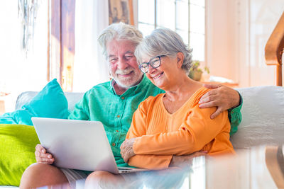 Side view of business colleagues working at home