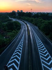 High angle view of highway against sky during sunset