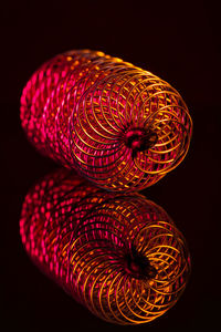 Low angle view of light painting against black background