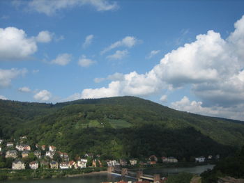 View of beach against cloudy sky