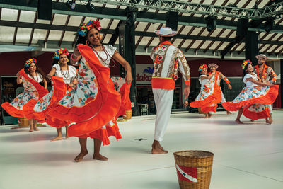 Group of people in traditional clothing during festival