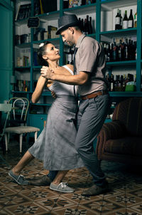 Couple dancing at home