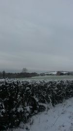 Scenic view of snow covered landscape