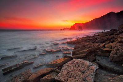 Scenic view of sea against sky during sunset