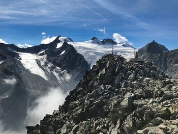 Scenic view of snowcapped mountains against sky