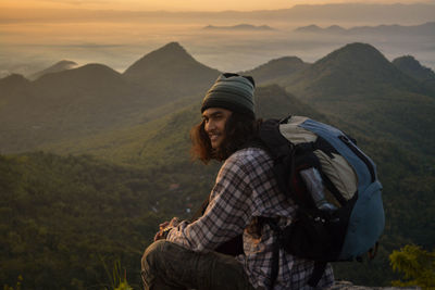 Man in mountains against sky