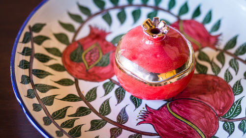 High angle view of strawberries in plate on table