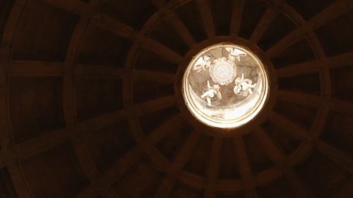 Low angle view of illuminated chandelier