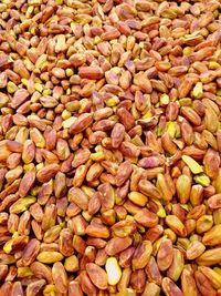 Full frame shot of pistachios for sale in market