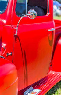 Close-up of red vintage car