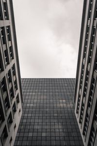 Low angle view of modern buildings against sky