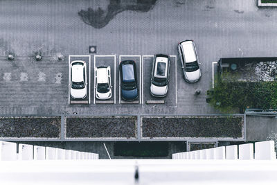 High angle view of cars parked on road in city