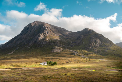 A lonely house on the foot of a hill in the highlands, scotland