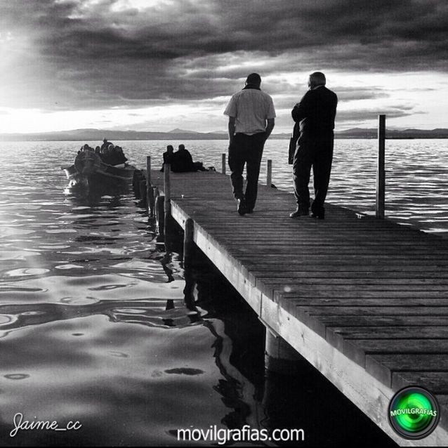 water, sea, men, sky, lifestyles, cloud - sky, leisure activity, rear view, pier, person, walking, standing, togetherness, full length, cloudy, beach, railing, nature