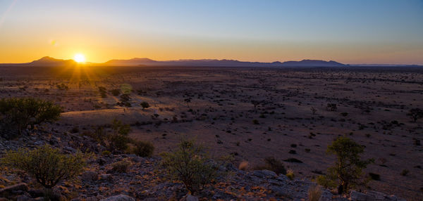 Scenic view of desert during sunset