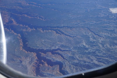 Aerial view of landscape seen from airplane window