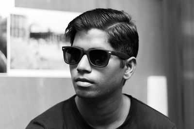 Close-up of young man wearing sunglasses