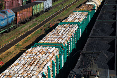 Omsk, russia - july 24, 2021, railway cars with coal wood. editorial.