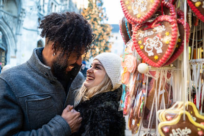 Smiling couple at christmas market