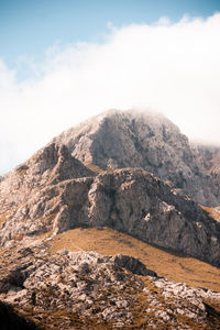 Scenic view of rocky mountains against sky