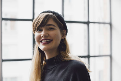 Portrait of a smiling young woman