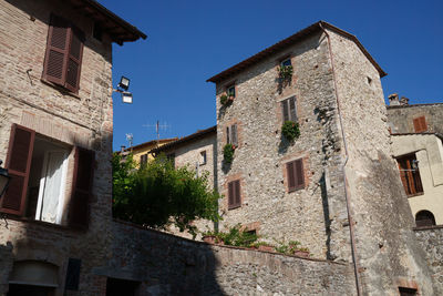 Low angle view of old building against sky