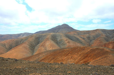 Scenic view of desert against sky