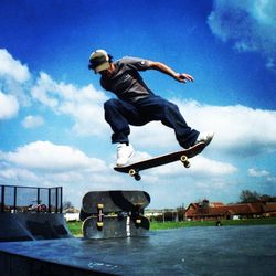 Low angle view of man skateboarding