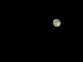 Scenic view of moon against sky at night