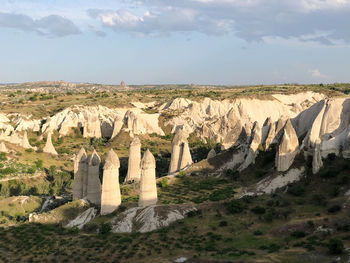 Panoramic view of rock formations against sky