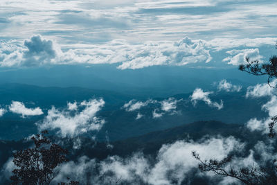 Scenic view of snow covered mountains against sky